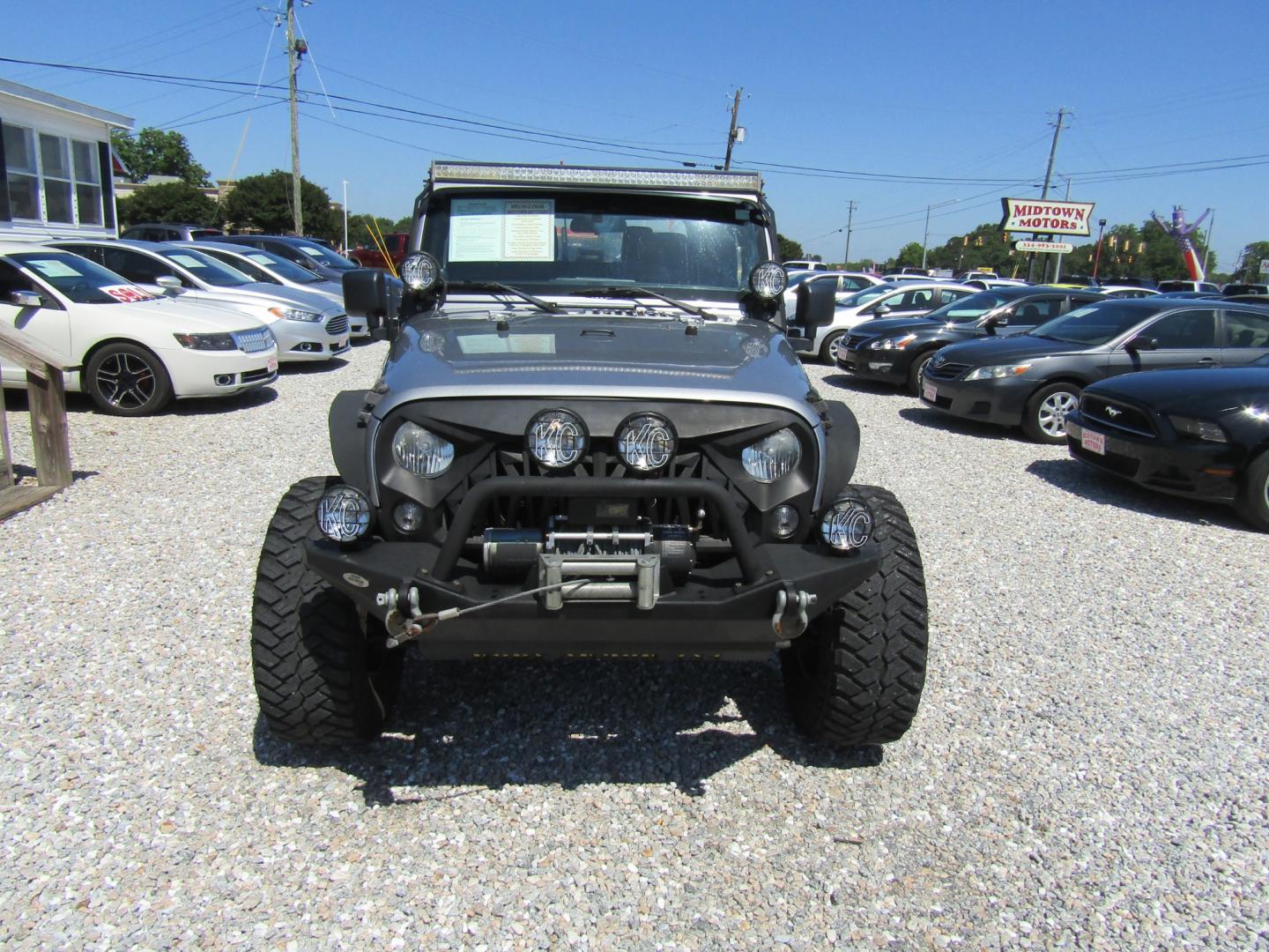 2014 Silver /Gray Jeep Wrangler Sport 4WD (1C4AJWAG5EL) with an 3.6L V6 DOHC 24V FFV engine, Automatic transmission, located at 15016 S Hwy 231, Midland City, AL, 36350, (334) 983-3001, 31.306210, -85.495277 - Photo#1